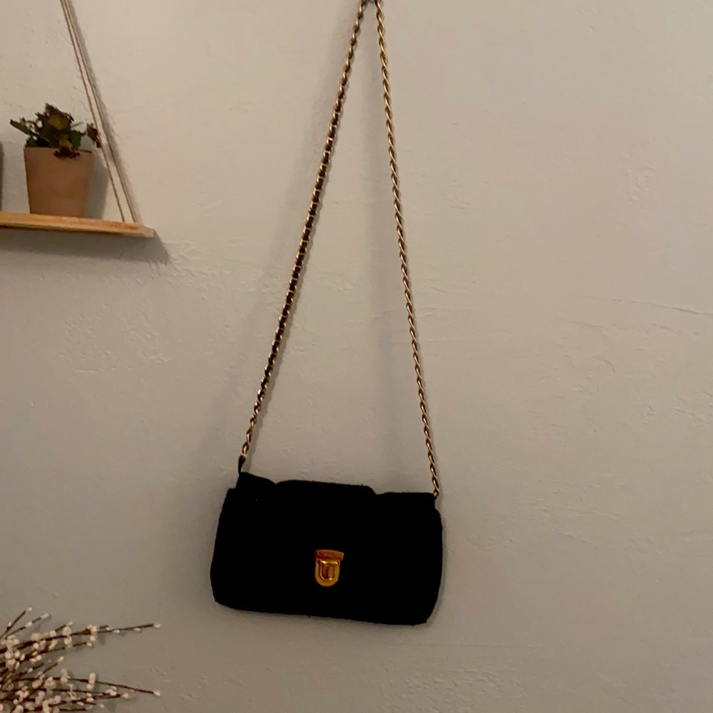 Unique and authentic Prada purse with various ways to wear
